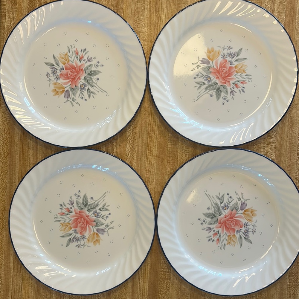Corelle by Corning “promise” set of 4 blue and flowered dinner plates.